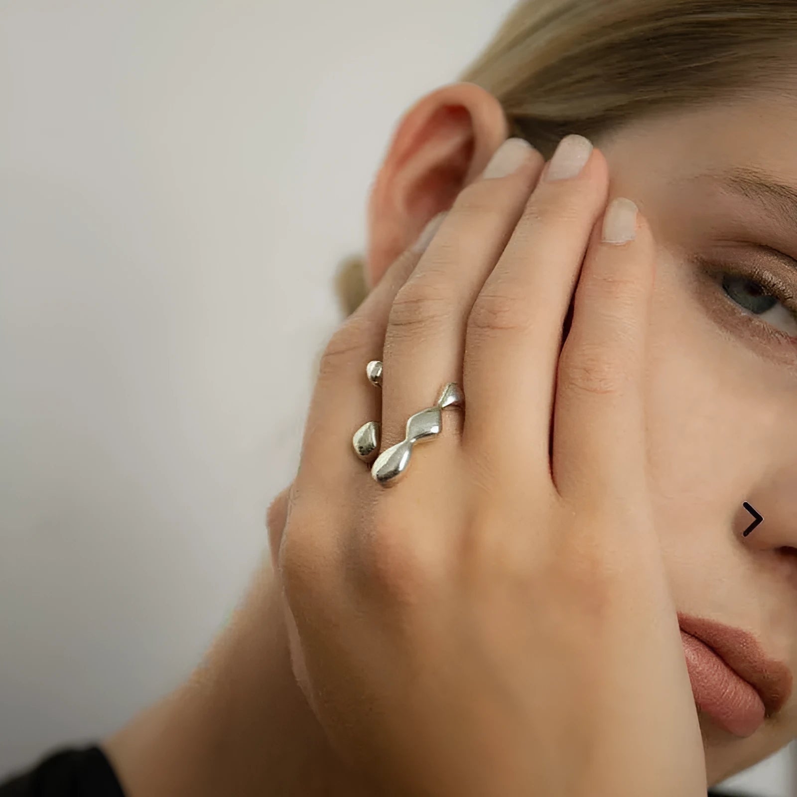Adjustable brass opening ring with circular sphere element in gold or silver finish