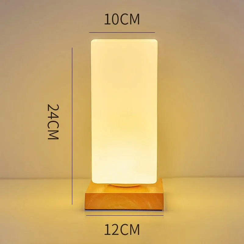 Nordic solid wood flower-shaped USB table lamp showing touch dimming and choice of cube or cylinder white light shapes.