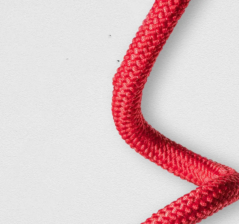 Red polyester weight-bearing skipping rope with 16cm handles on a white background