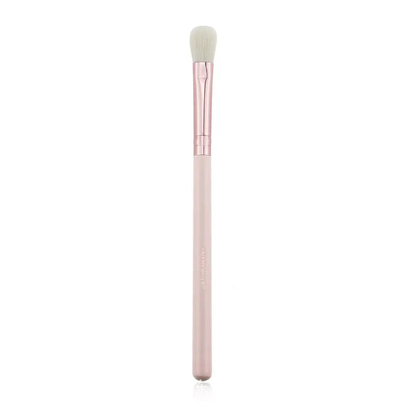 26 pink makeup brushes with wood handles arranged in a PU travel pouch.