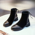 Women's black knee-high Martin boots with side zip and bow detail