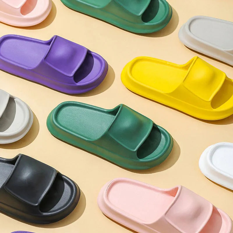 Pair of thickened EVA flip-flop slippers in a chosen colour, showing the non-slip sole and unisex design.