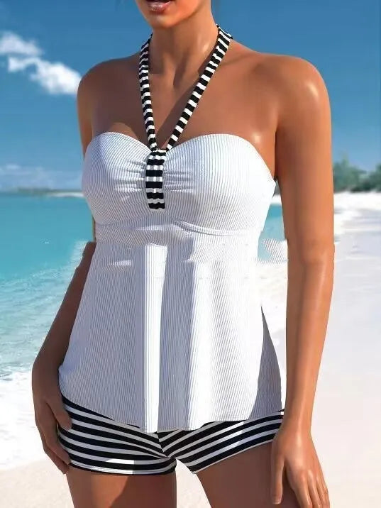Women's solid colour striped off-shoulder one-piece swimsuit on a mannequin, showing the briefs style and removable lining.
