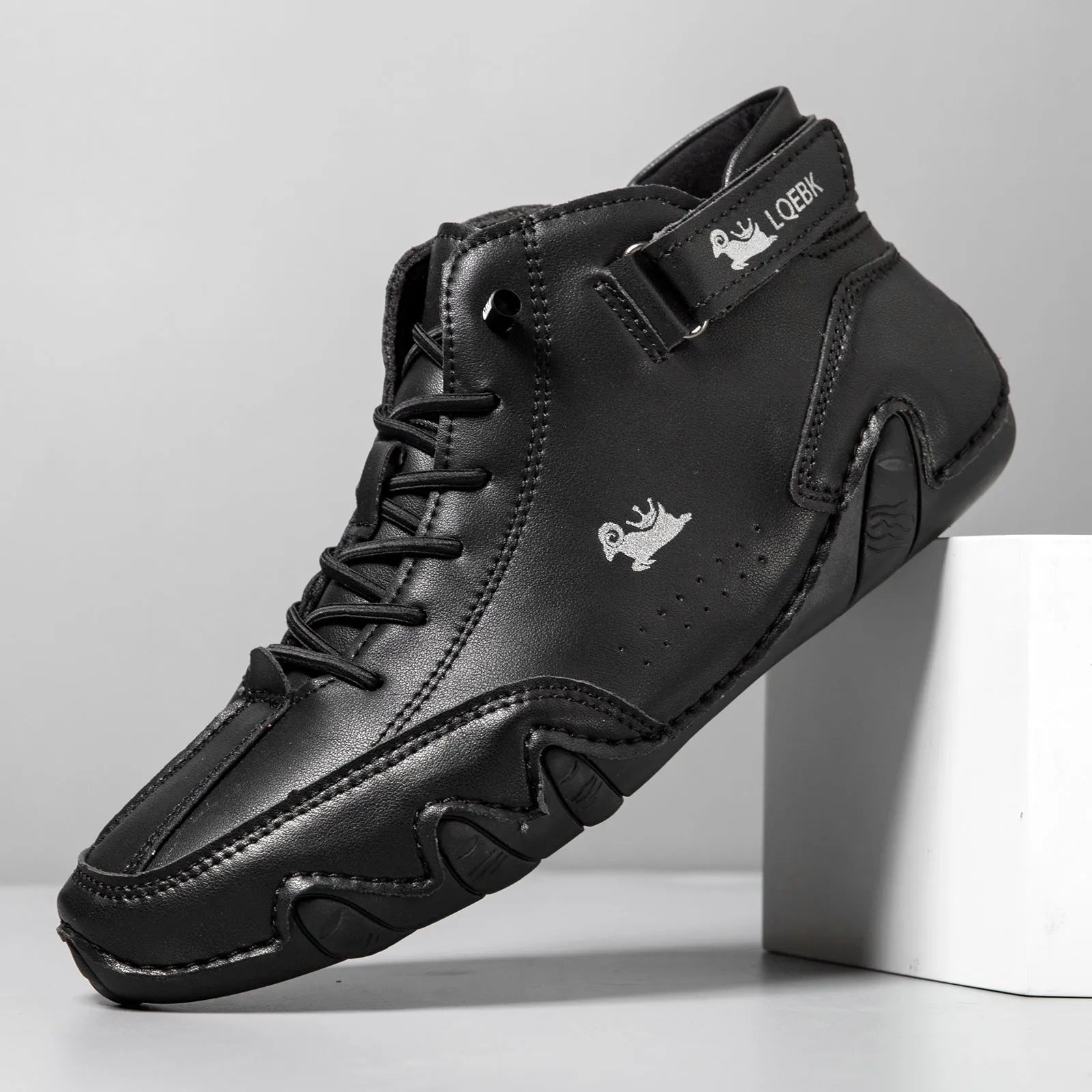 Men's brown high-top octopus Martin boots with a round toe and visible stitching on a flat rubber sole.