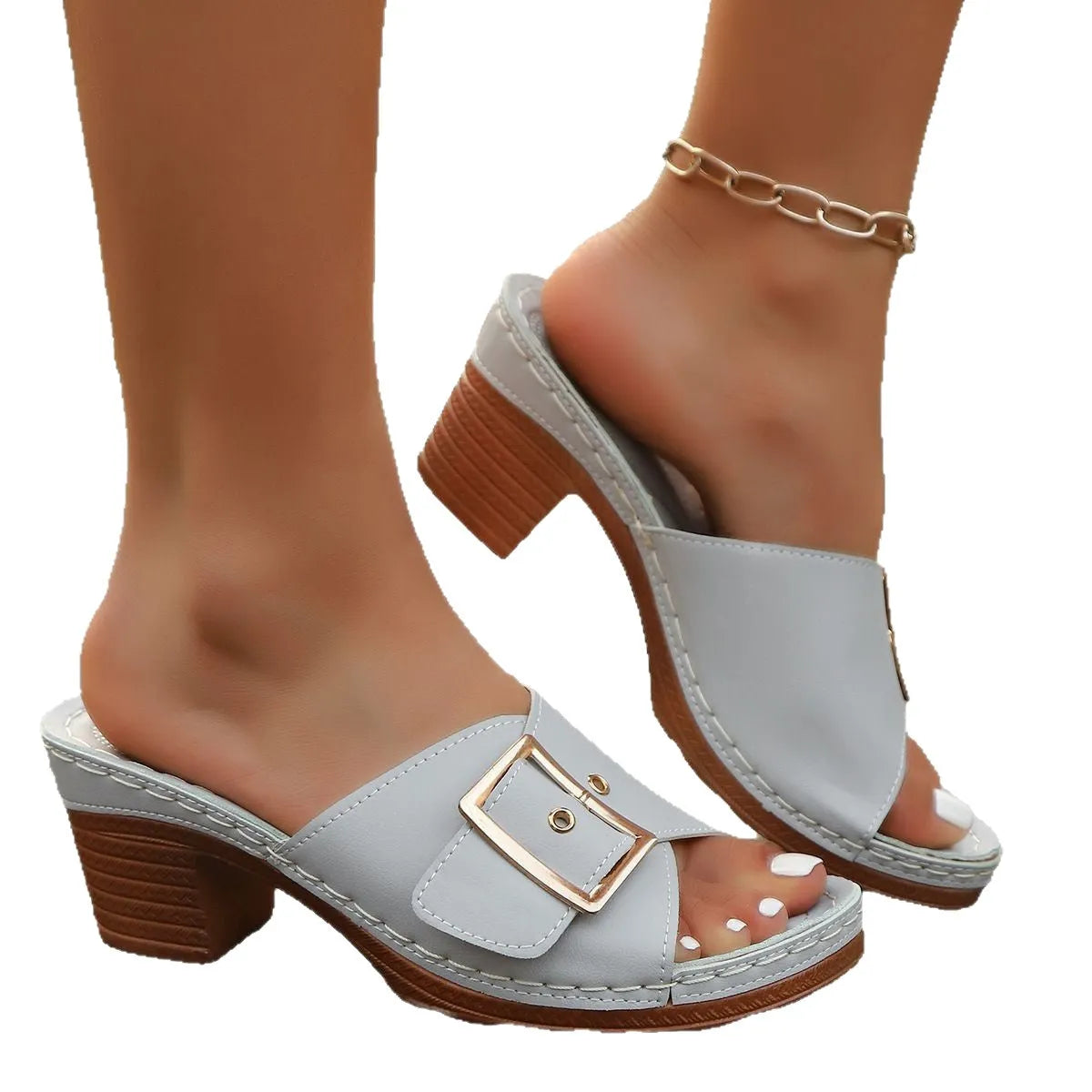 Women's black retro chunky heel slippers with a silver metal buckle closure on a round toe.