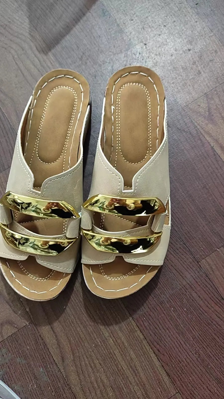 Roman style platform sandals in black, white, khaki, and sea blue colours on a rubber sole.