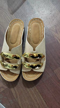 Roman style platform sandals in black, white, khaki, and sea blue colours on a rubber sole.