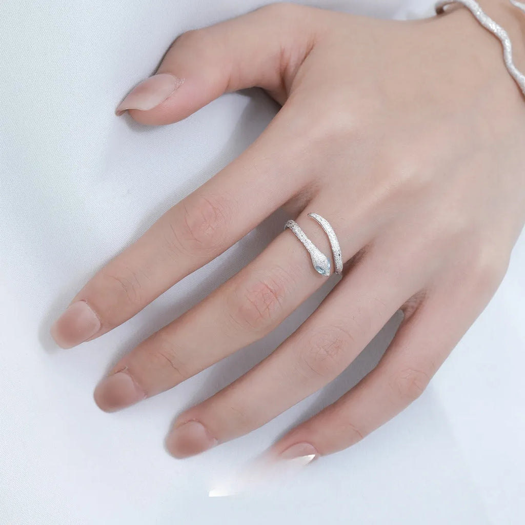 Adjustable silver ring with snake zodiac design electroplated in platinum colour