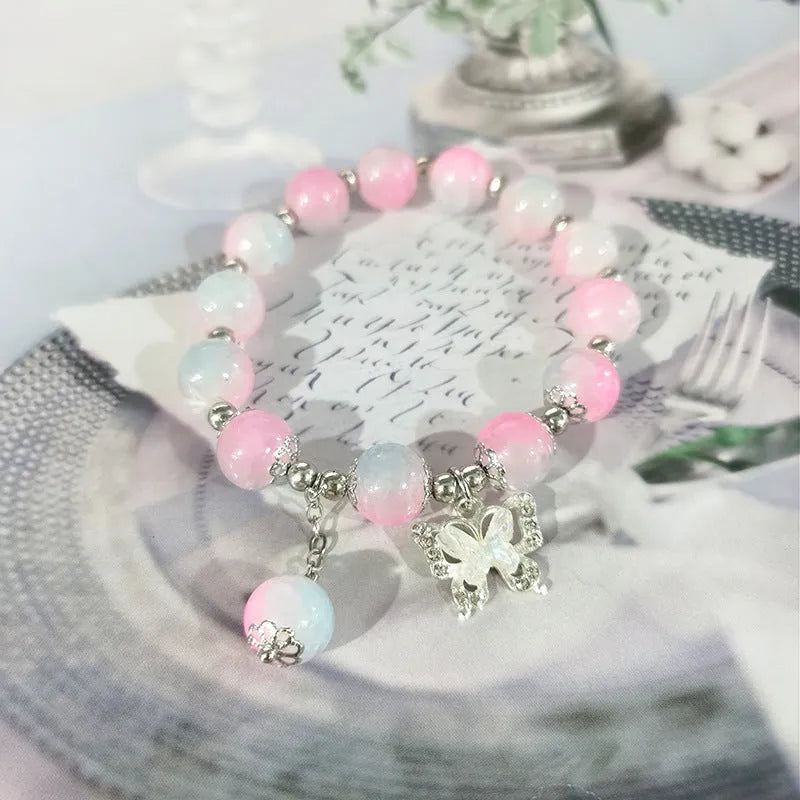 Handmade Chinese style glass bracelet with bamboo joint beads in a red Lvzhu Duobao design.