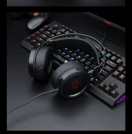 Black wired computer gaming headset with 3.5mm audio jack and cable