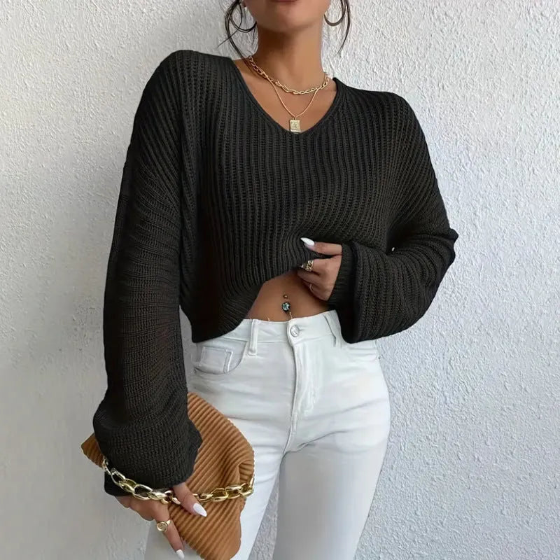 Women's loose fit long sleeve pullover top in solid colour with regular sleeves