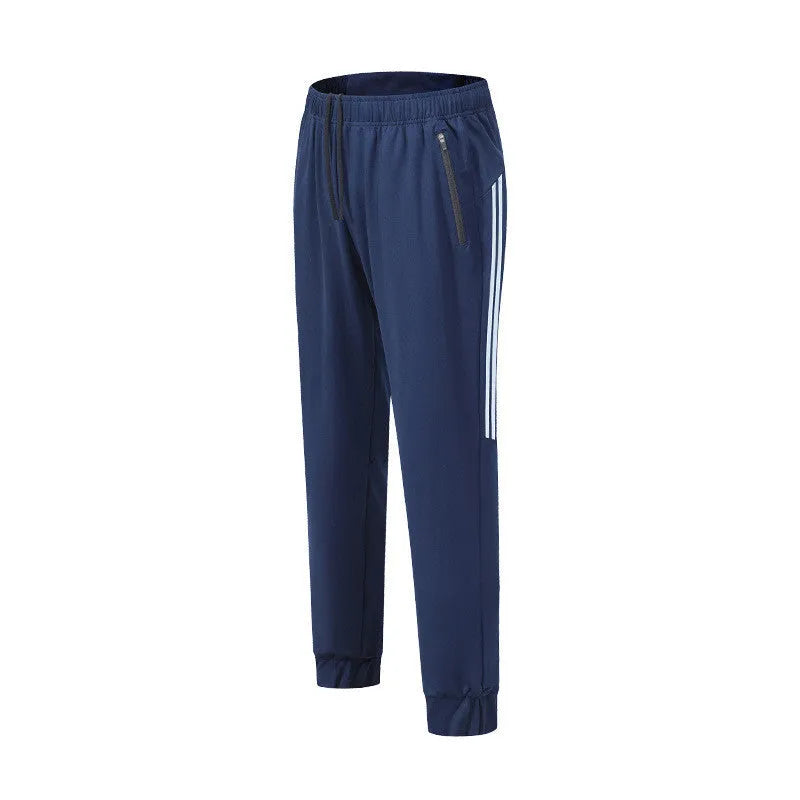 Men's black running trousers with mid waist design and polyester fabric for exercise activities