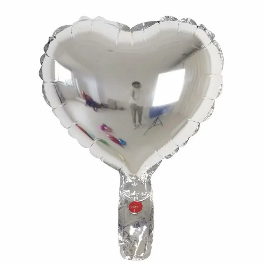 Five peach heart-shaped aluminium balloons with metallic red finish for party decoration