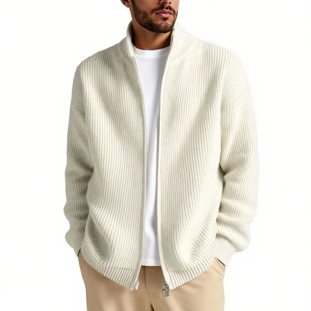 Man wearing a loose grey men's cardigan sweater, a casual acrylic knitwear piece for leisure.