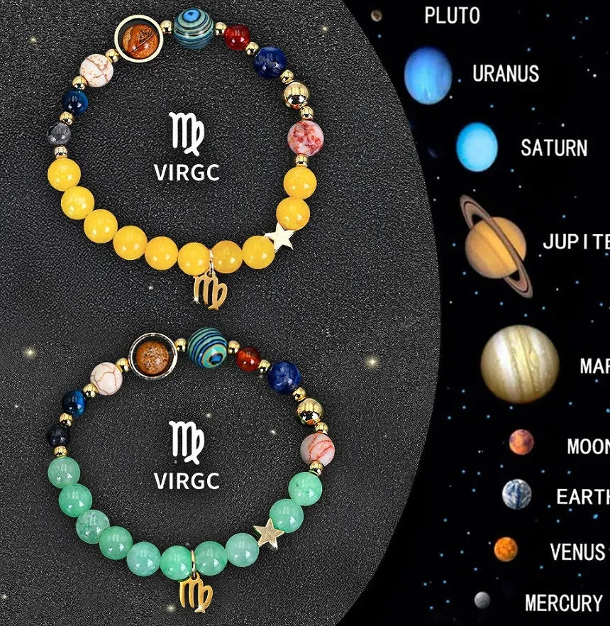 Set of twelve natural stone zodiac bracelets showing detailed astrological charms on stretch cords