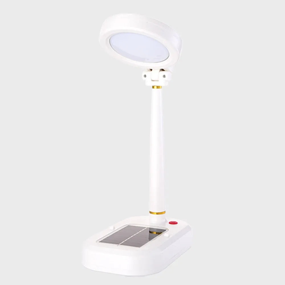 Ivory white solar-powered table fan with integrated LED study lamp on a desk