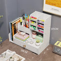 Square plastic pen holder storage box with oblique insertion compartments for writing instruments