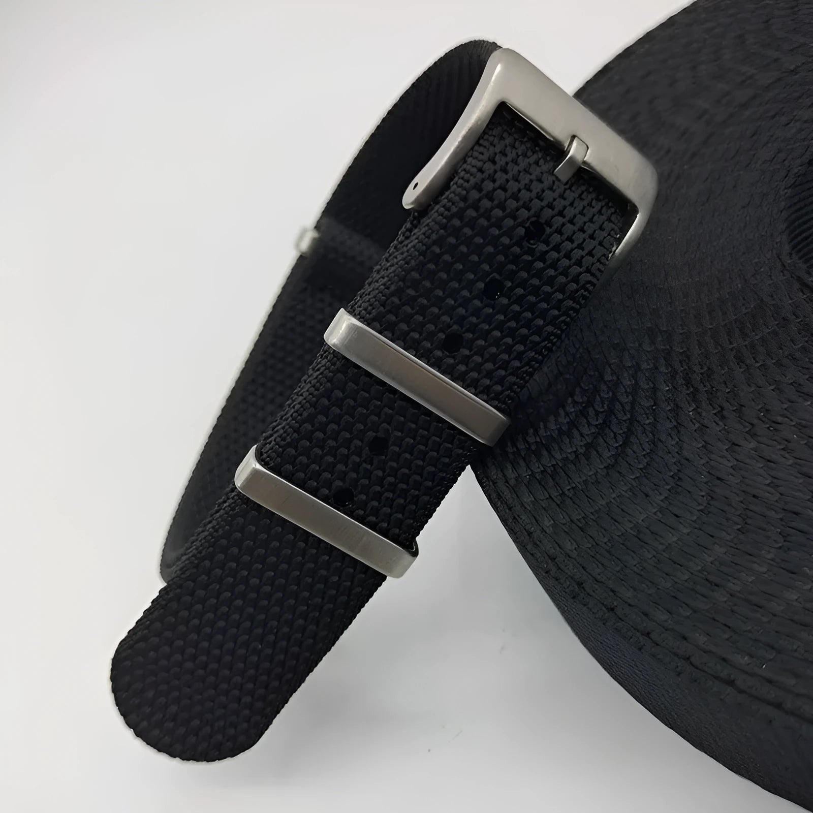 Nylon integrated watch strap in military colours showing 20mm and 22mm width options