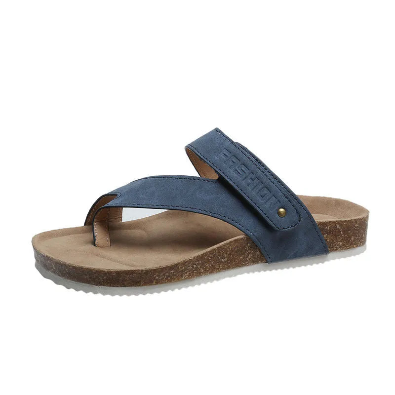 Women's flat toe ring flip-flop in a solid colour with a thick foam sole.