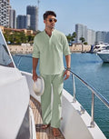 Men's solid colour cotton suit with long sleeve top and trousers in beige, shown laid flat