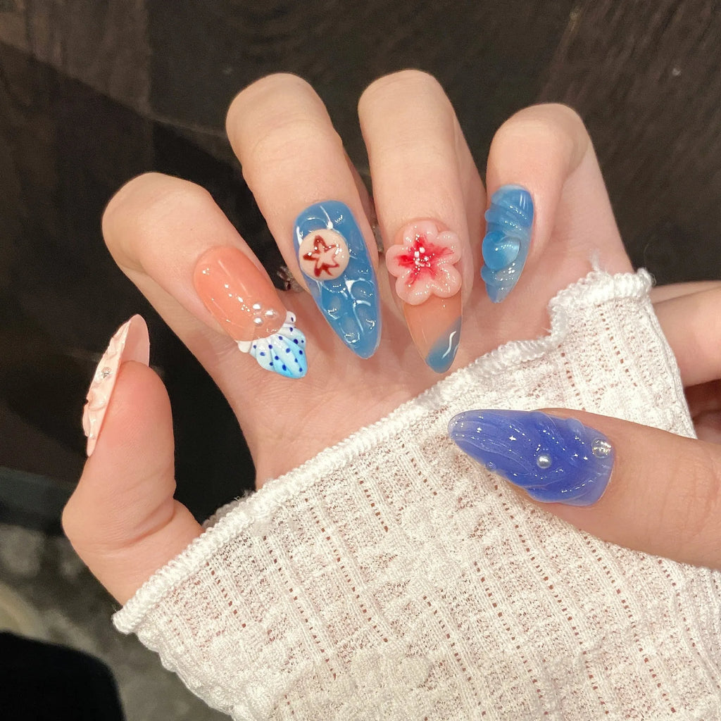 Plastic marine style armour with three-dimensional carved jellyfish design in almond nail colour