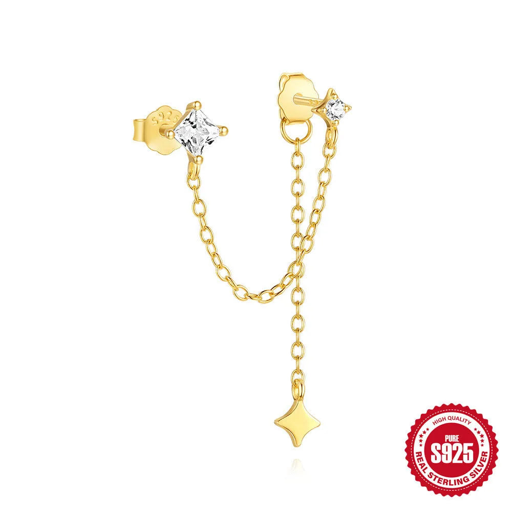 Golden geometric sterling silver earrings with zircon details for double piercings