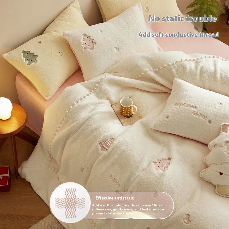 Princess-style four-piece bedding set with green Christmas tree pattern on a bed.