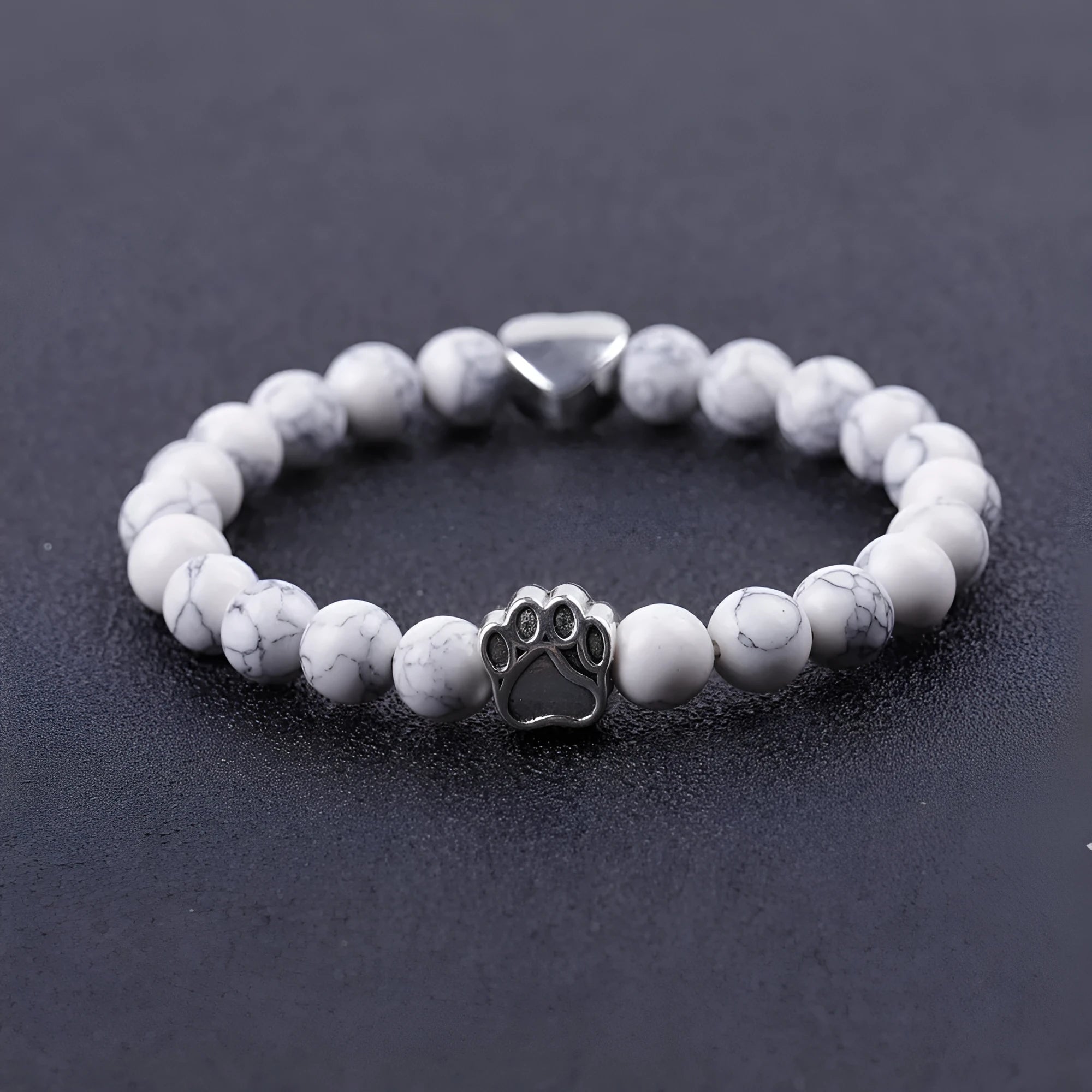 Indian agate stone bracelet with geometric dog's paw charm and heart detail on round beads