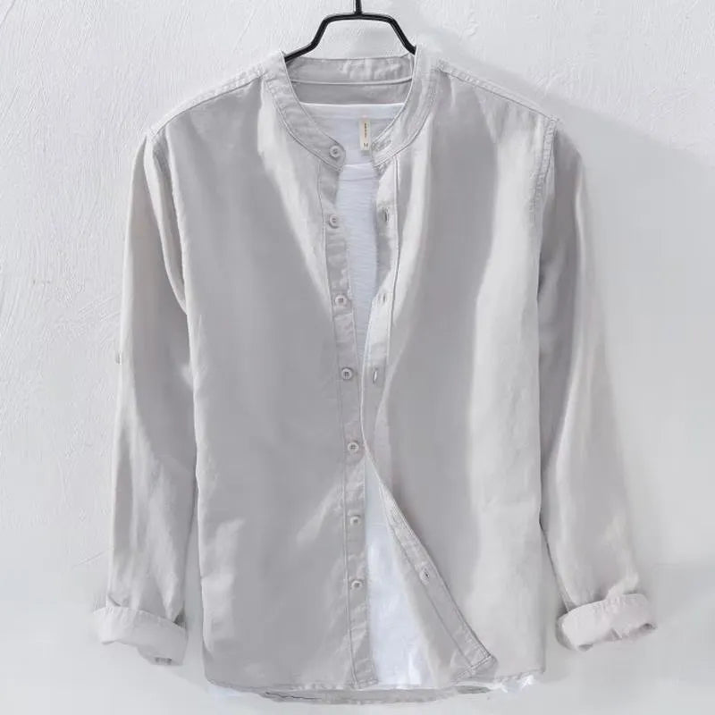 Men's loose long sleeve linen casual shirt in solid colour, shown on a hanger.