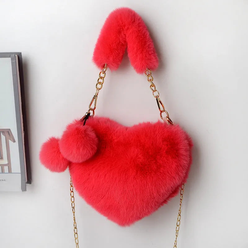 Heart-shaped women's plush handbag with soft texture and detachable shoulder strap in medium size