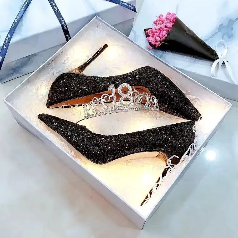 Women's silver PU leather bridal shoes with crystal detail on a stiletto heel.