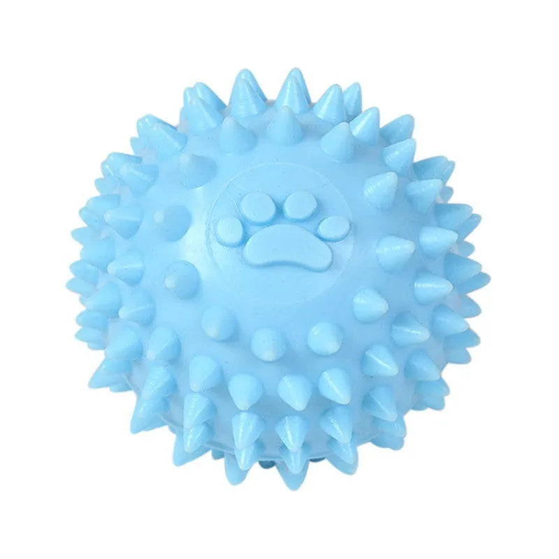 Blue, pink, or yellow TPR dog chewing ball with textured sides for tooth cleaning