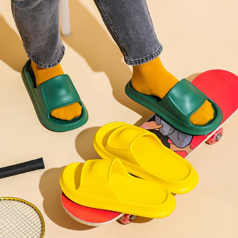 Pair of thickened EVA flip-flop slippers in a chosen colour, showing the non-slip sole and unisex design.