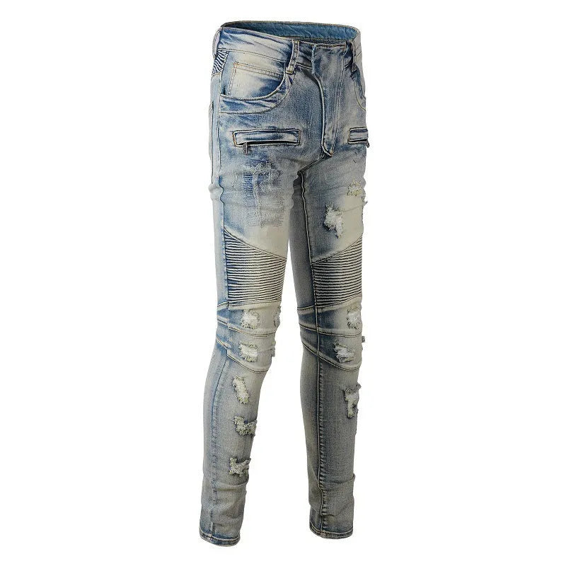 Light blue men's slim fit distressed jeans with hand-frayed detailing on a mid waist.
