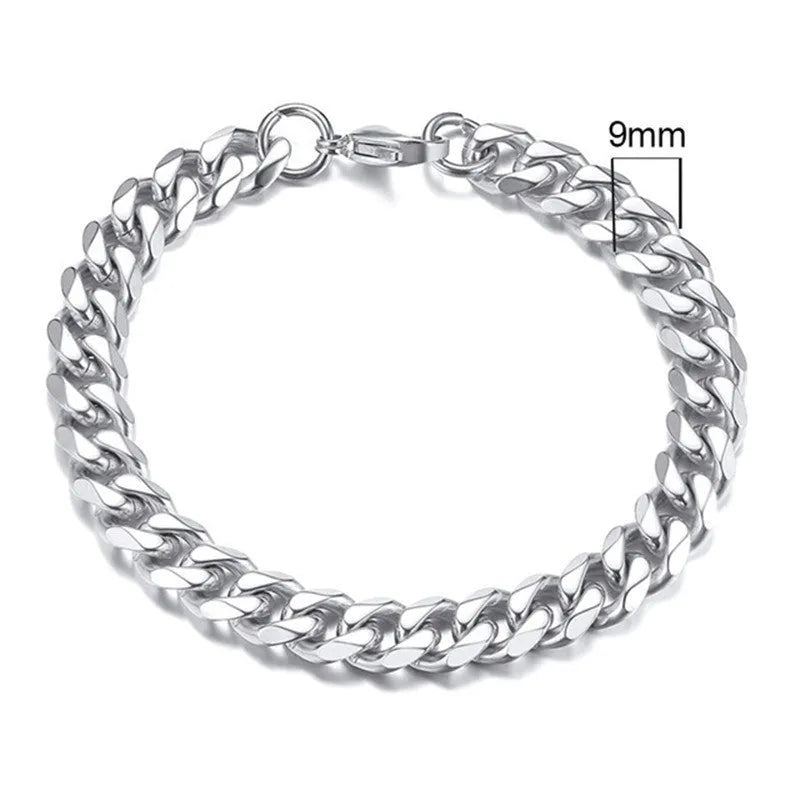 Six-sided geometric Cuban link metal bracelet in gold, black, and steel colour finishes.