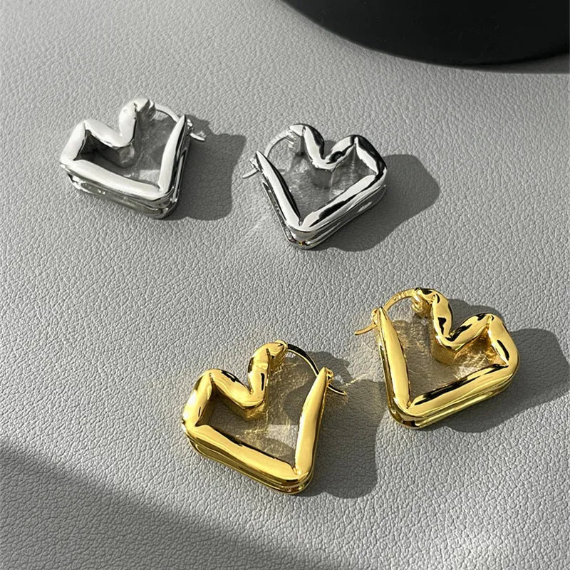 Unisex heart shaped ear clip earrings in gold and silver, retro minority design