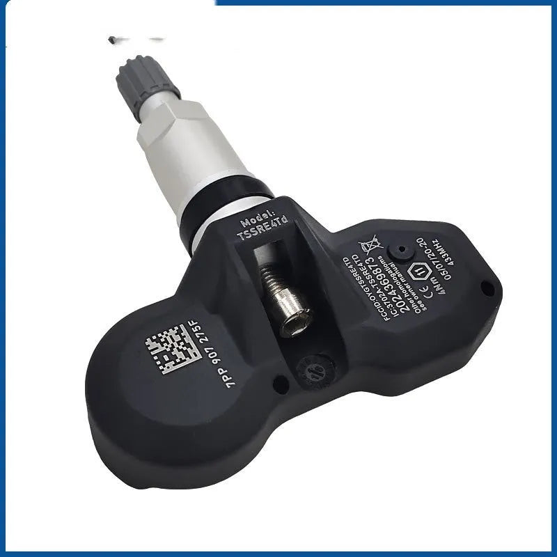 Black car tyre pressure monitoring sensor unit for Audi vehicles.