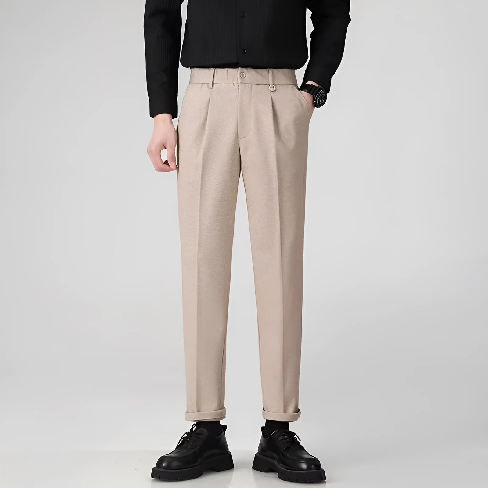Men's straight leg polyester trousers in black on a hanger, business casual style