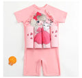 Children's buoyancy swimsuit with shark design showing one-piece swimwear with flotation features