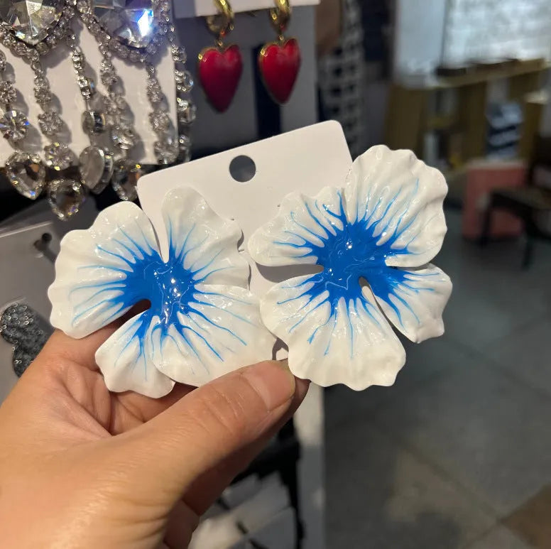 Pastoral style alloy earrings with oil-spot glaze floral designs in four colour options