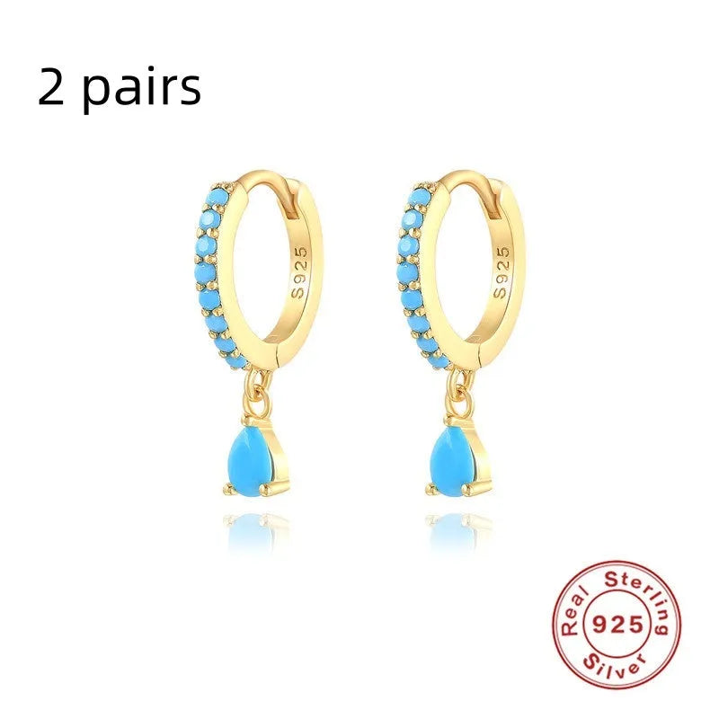 Geometric water drop earrings in Sterling Silver with electroplated gold finish and purple diamond stones