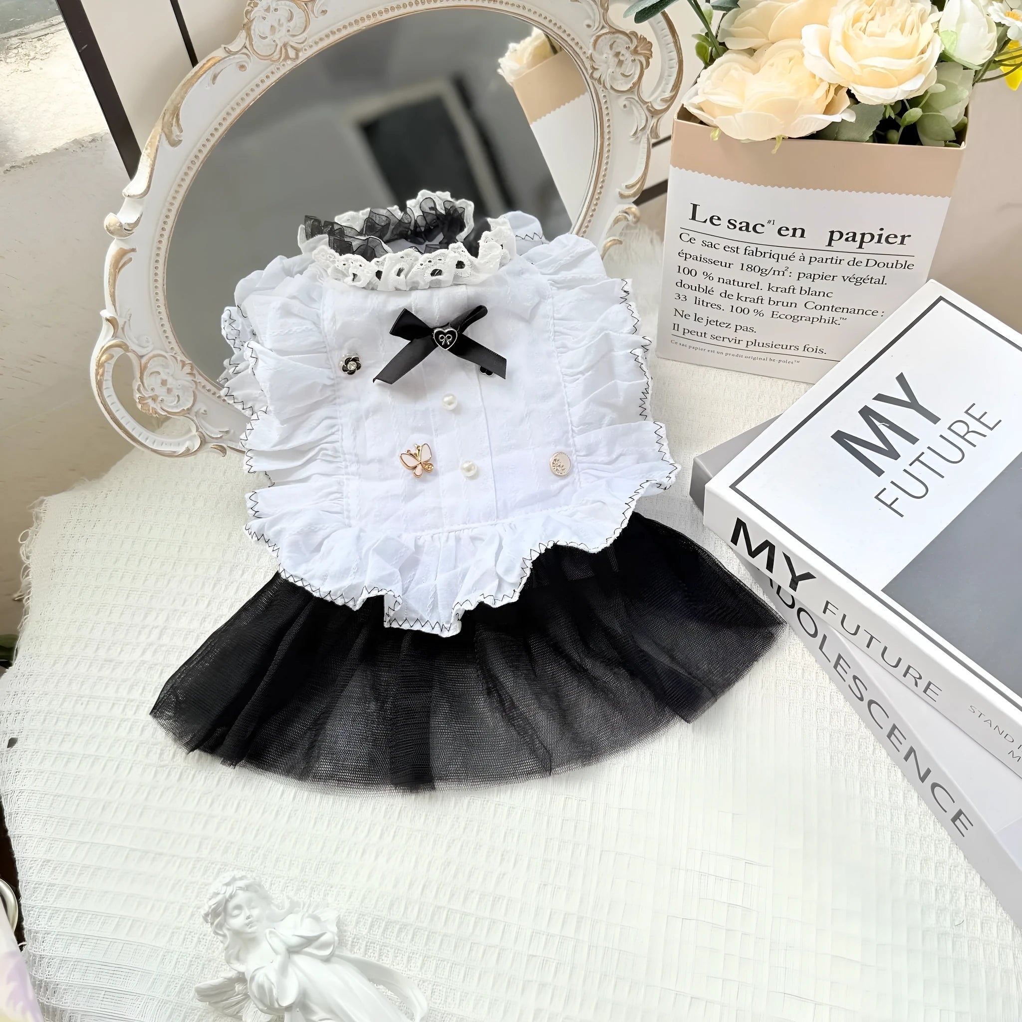 White polyester princess-style waltz gauze skirt for a small dog on a mannequin.