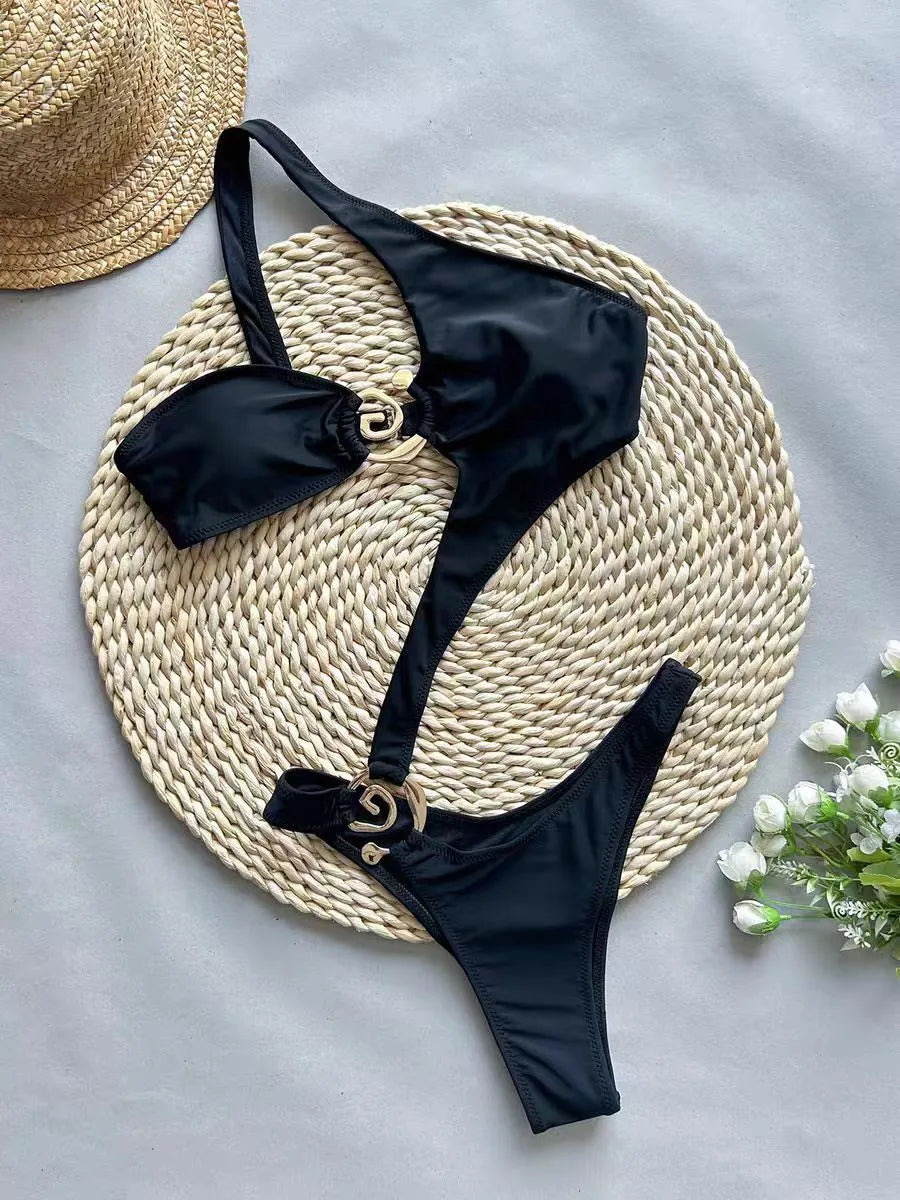 Women's black nylon printed bikini swimsuit set, front view, showing top and bottom pieces