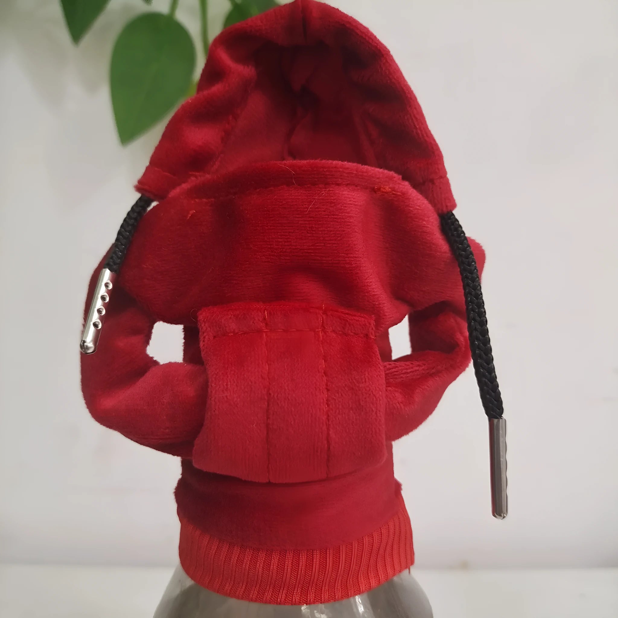 Pure cotton knitted gear lever sweater decoration in assorted colours on a car gear stick.