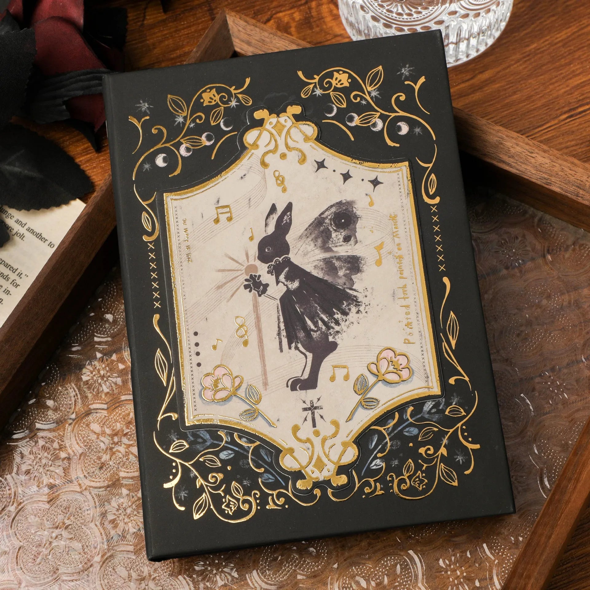 Retro gothic style A5 notebook with hand-drawn art cover designs including maze, forest, and fruit themes