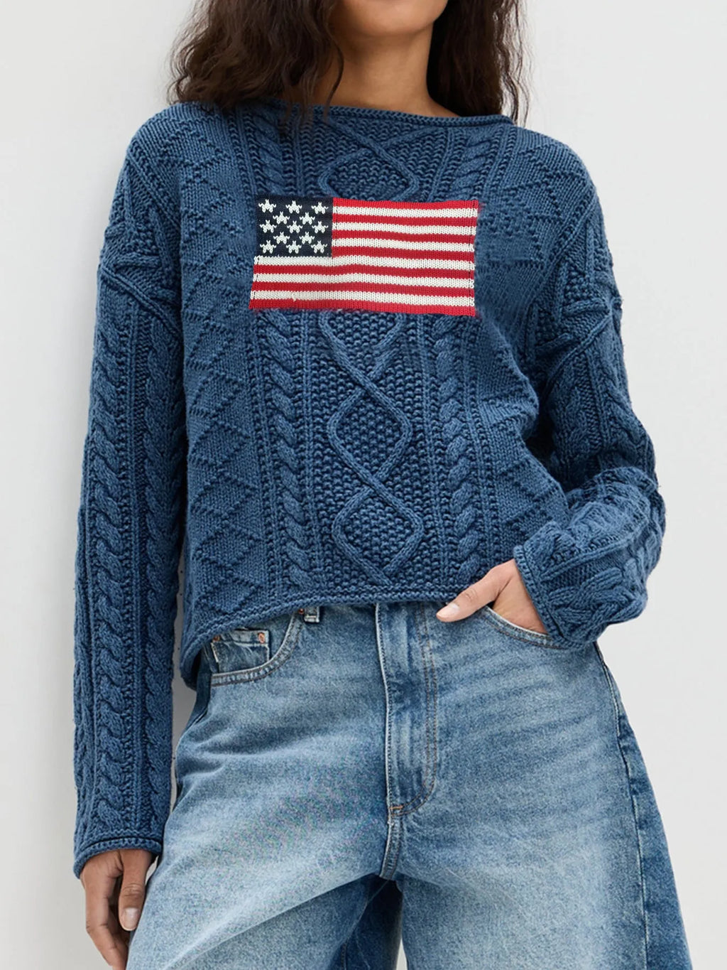 Women's navy blue acrylic fibre pullover top with national flag pattern, long sleeves, front view