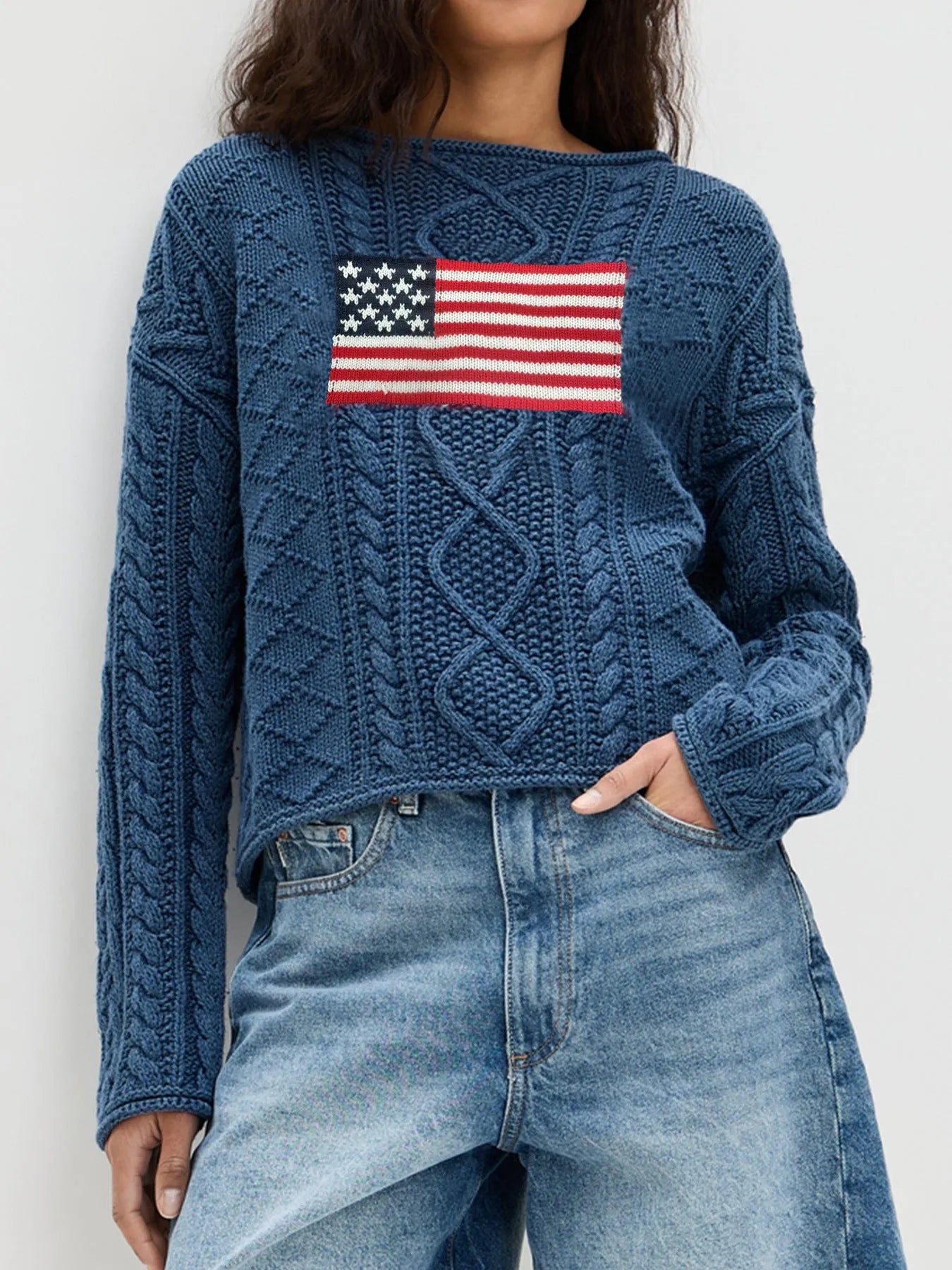 Women's navy blue acrylic fibre pullover top with national flag pattern, long sleeves, front view