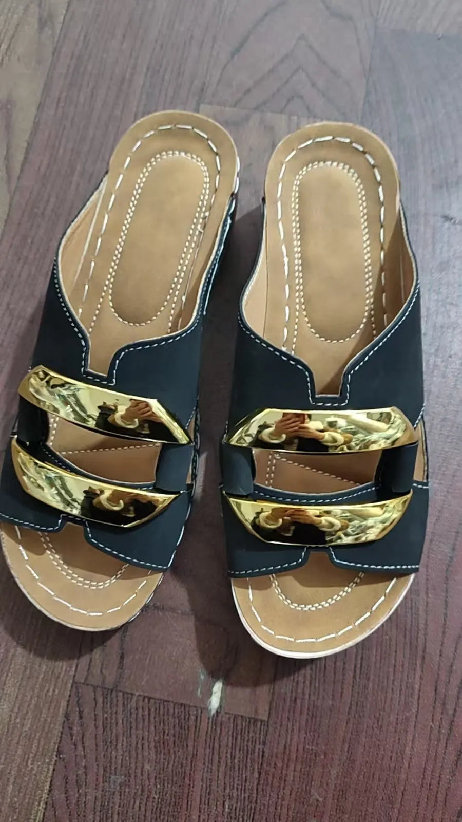 Roman style platform sandals in black, white, khaki, and sea blue colours on a rubber sole.