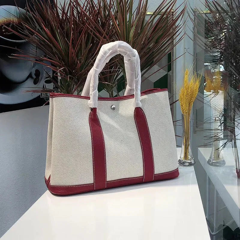 Genuine leather crossbody bucket tote bag with canvas surface in multiple colour options