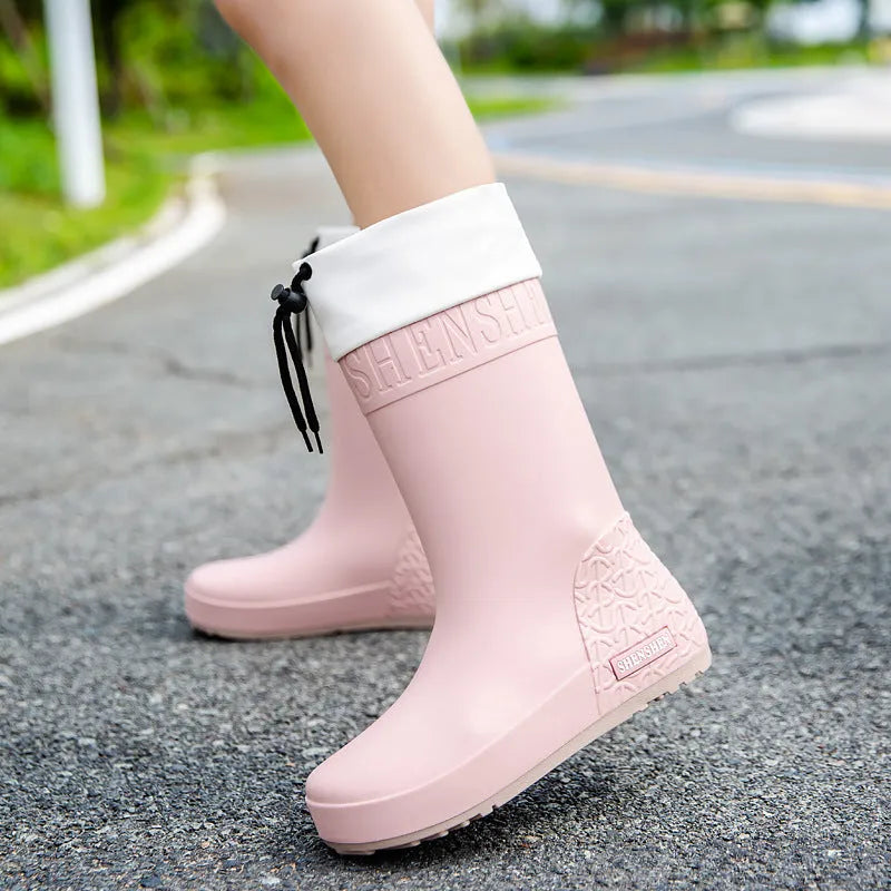 Women's PVC rain boots in apricot, black, brown and pink colours with non-slip wear-resistant construction